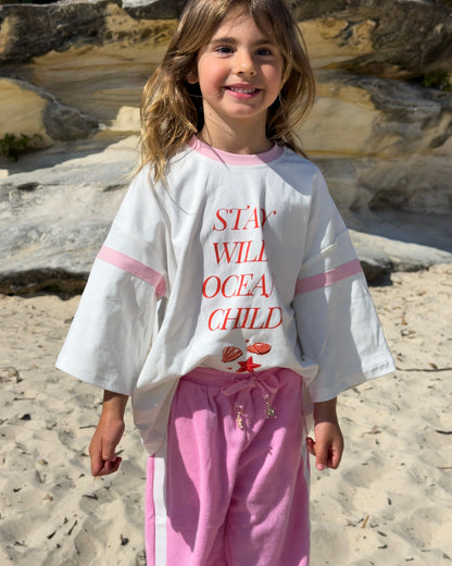 Stay Wild Ocean Child Tee, girls' oversized white graphic tee, front view