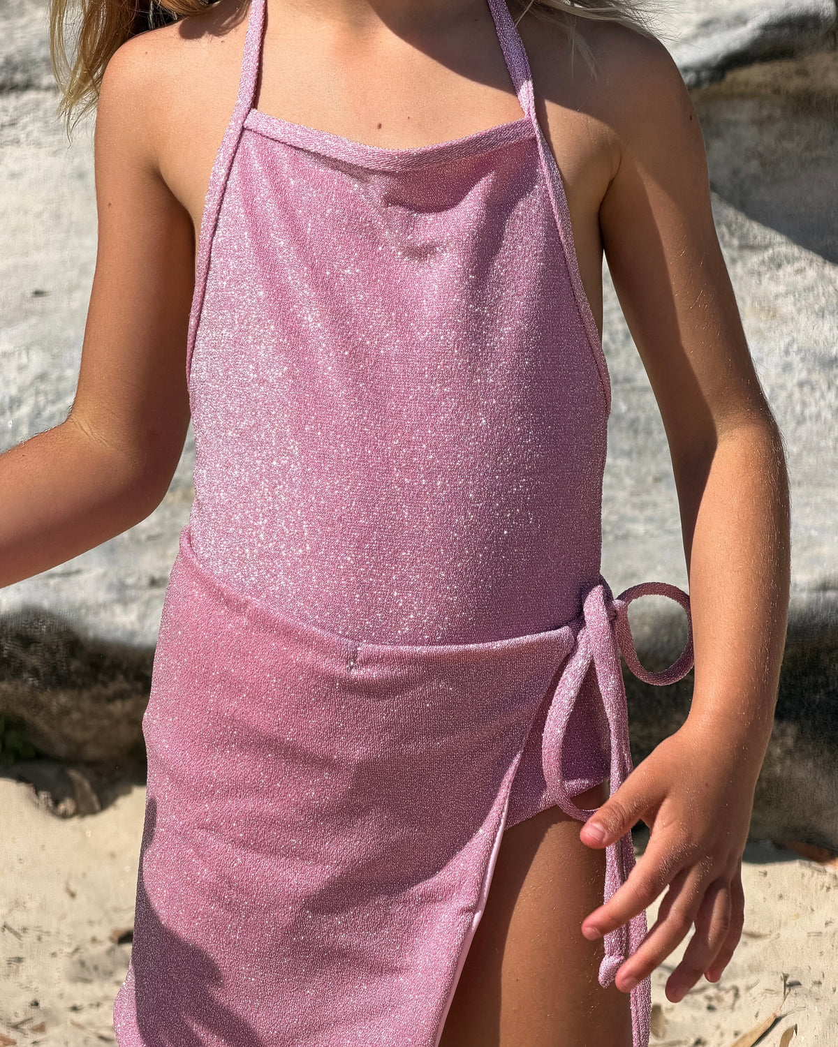 Sparkle One Piece and Sparkle Sarong in Pink, girls' sparkle swimsuit and wrap sarong, close-up